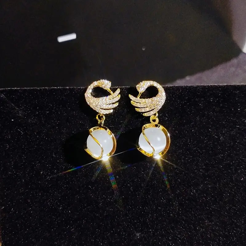 FREYA™ SWAN PENDANT EARRINGS